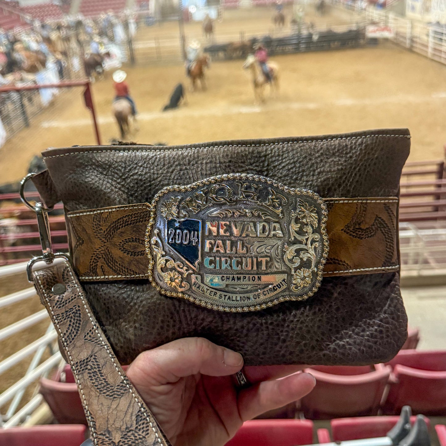 Trophy Buckle Leather Wristlet Bag In Rustic Cocoa